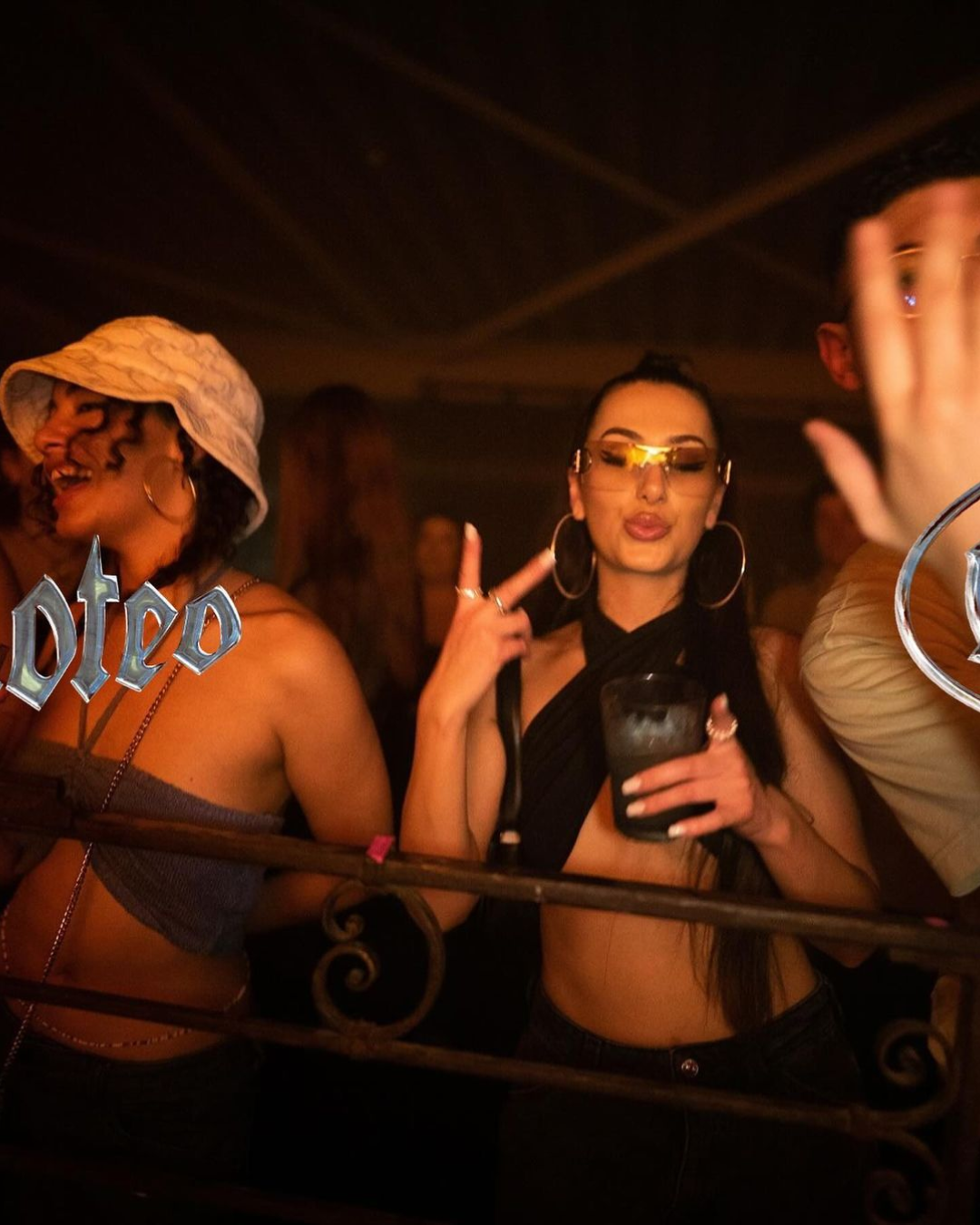 Photo of Bailoteo dancers with half of the logo placed on it