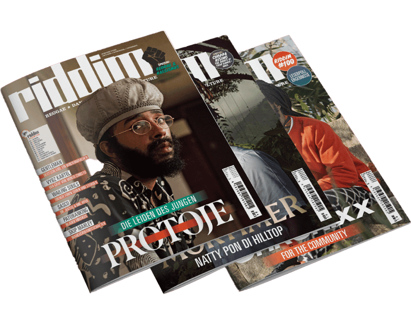 A stack of printed RIDDIM Magazines featuring reggae artist photography.